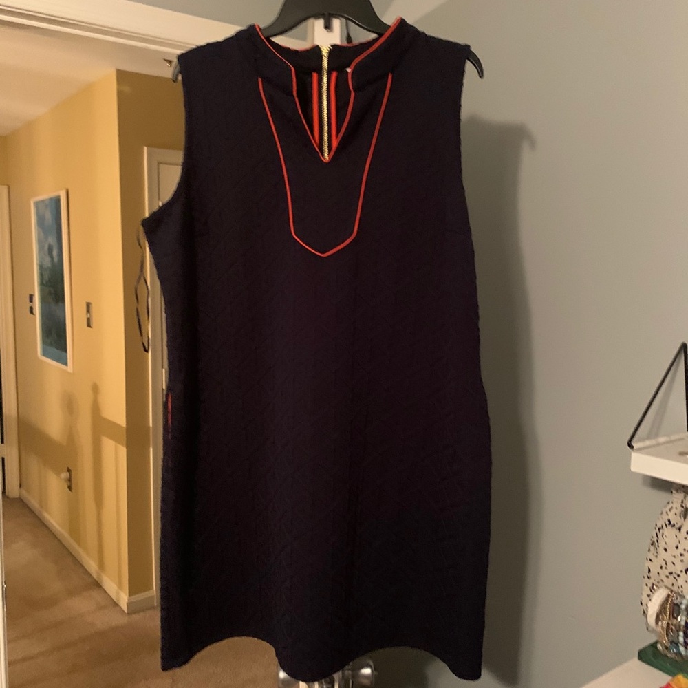 Macy’s blue dress with orange detailing